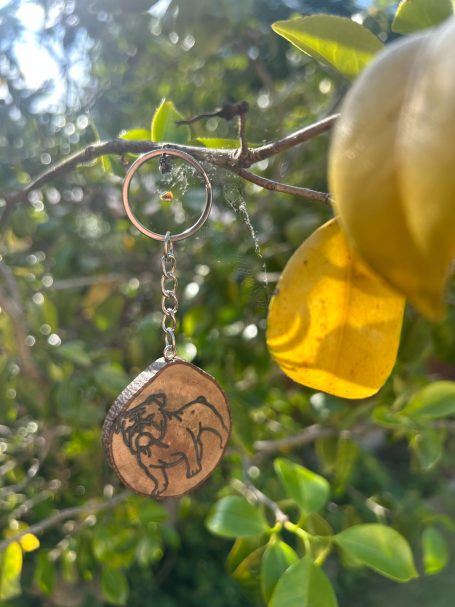 Handmade personalised wooden pet keyring engraved with a dog